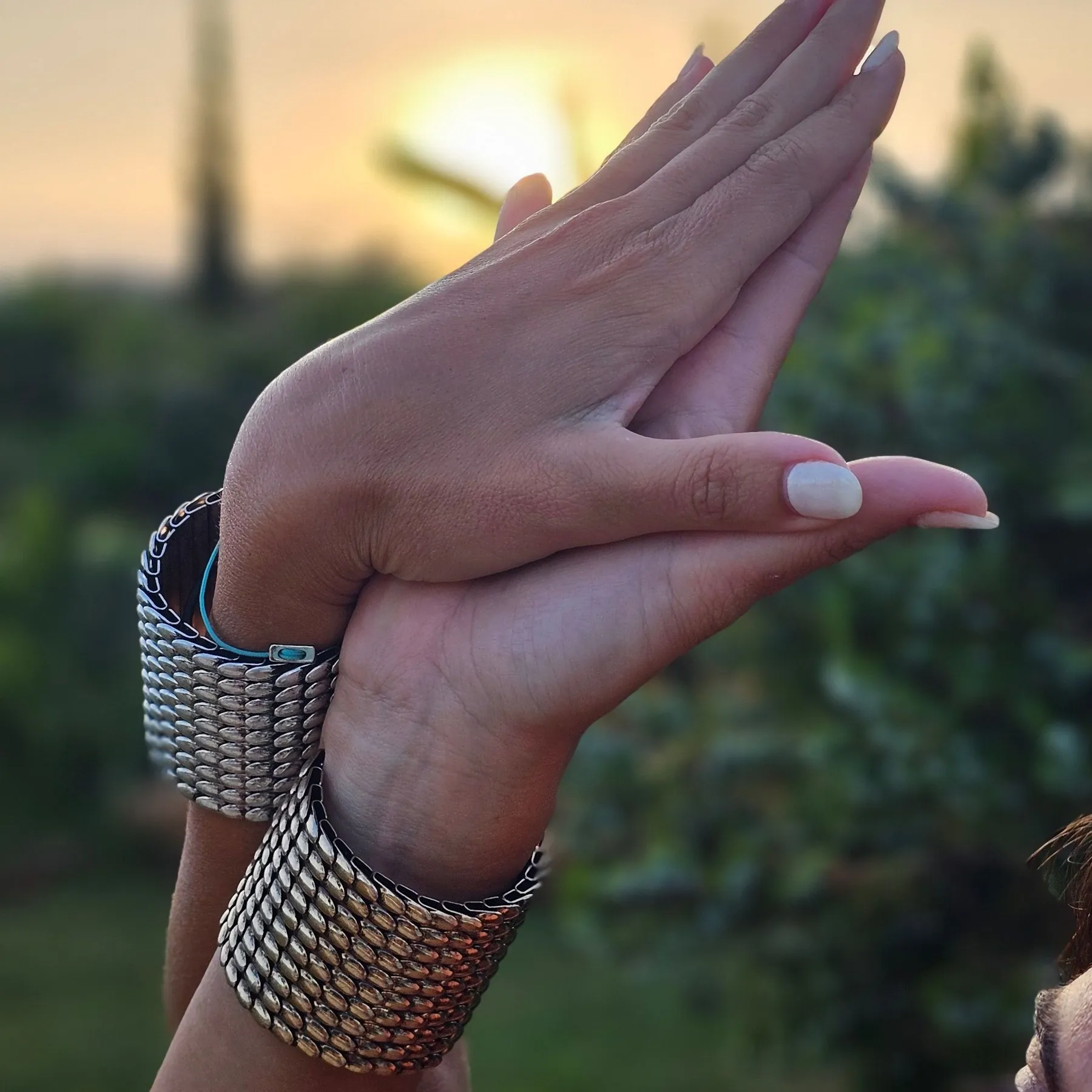 Close-up of hands on the abdomen while breathing